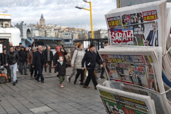 Istanbul, Turkey. January 8th 2025. Turkish daily news and sports papers displayed on a stand as passengers disembark the ferry from the Asian side of Istanbul, Turkey