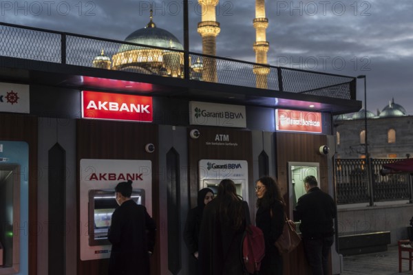 Istanbul, Turkey 8th January 2025 Customers using Turkish bank ATM's near the Bosporus on the European side of Istanbul, Turkey