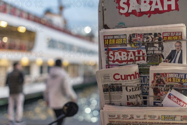 Istanbul, Turkey. January 8th 2025. Turkish daily newspapers displayed on a stand at Karakoy Ferry Station on the European side of Istanbul, Turkey