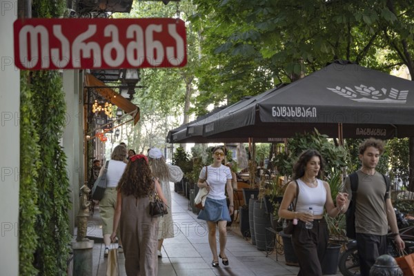 Tbilisi, Georgia. July 29th 2025. A typical busy Georgian street scene along Shota Rustavelii Avenue, popular for cafes, shops and entertainment, Tbilisi, Georgia