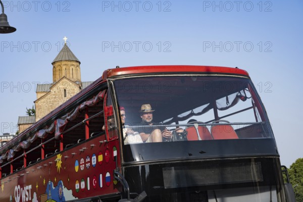 Tbilisi, Georgia. July 29th 2025. Tourists on a double decker bus taking a sightseeing trip around Tbilisi, Georgia