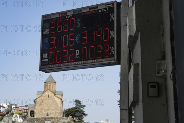 Tbilisi, Georgia. July 29th 2025. A currency exchange rate display board outside an exchange bureau in Tbilisi old town. Georgia
