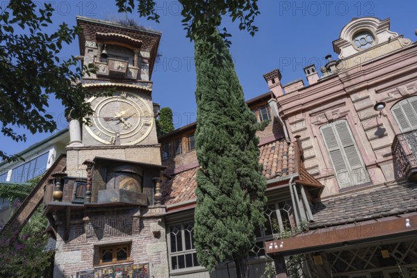 Tbilisi, Georgia. August 5th 2025. The ornate clock tower of the Gabriadze Marionette Theater, Georgian puppet theater in Tbilisi, Georgia