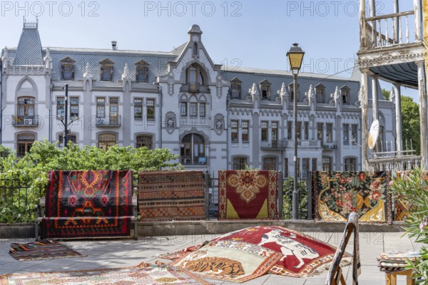 Tbilisi, Georgia. August 5th 2025. Traditional patterned rugs and carpets for sale outside a shop in Tbilisi Old Town, Georgia