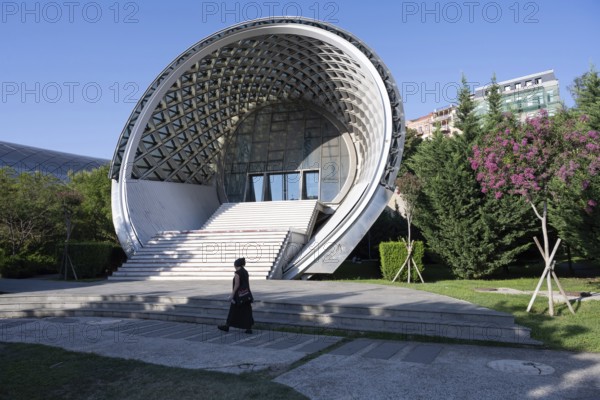 Tbilisi, Georgia. August 19th 2025. The modern architecture of Rike Music Theater and Exhibition Center in Rike Parke near the Peace Bridge, Tbilisi, Georgia