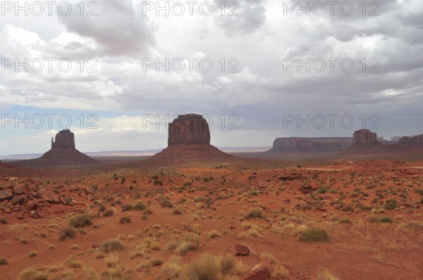 Vast desert landscape of Monument Valley with characteristic rocks, Monument Valley, Navajo Tribal Park, Navajo Nation Reservation, Utah, Arizona, USA