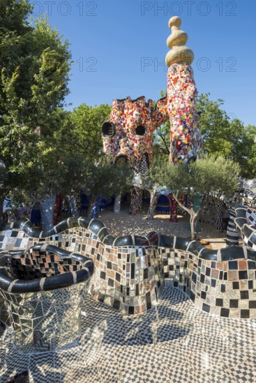 Colourful sculptures made of glass and mirrors, Giardino dei Tarocchi, Garden of Tarot, by Niki de Saint Phalle, near Capalbio, Province of Grosseto, Tuscany, Italy