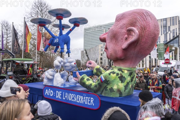 Rose Monday procession in Düsseldorf, theme car by wagon manufacturer Jacques Tilly, theme Putin steers the AFD as a drone, with the face of AFD party leader Alice Weidel, proximity to Russia, influenced by state propaganda, North Rhine-Westphalia, Germany
