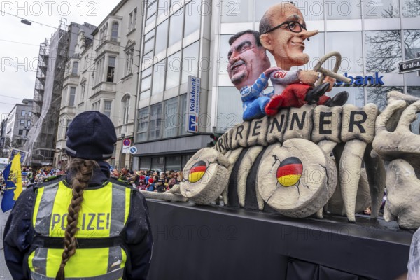 Rose Monday procession in Düsseldorf, theme cars by wagon manufacturer Jacques Tilly, Merz and Söder ride a combustion fossil, fight against an EU-wide combustion stop for vehicles, North Rhine-Westphalia, Germany