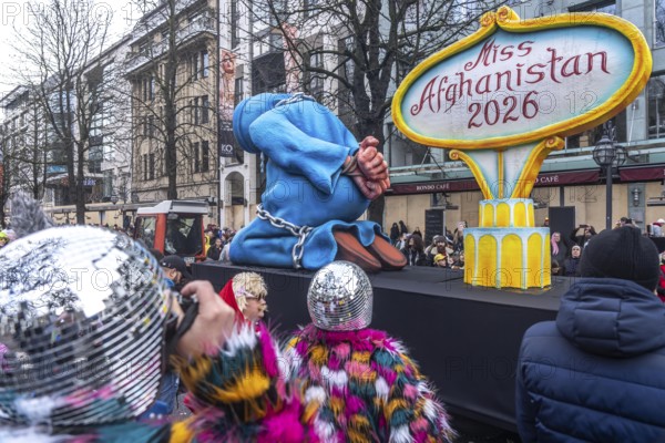 Rose Monday procession in Düsseldorf, theme car by wagon manufacturer Jacques Tilly, theme woman's rights in Afghanistan, Miss Afghanistan, in burqa and chains, against the Taliban regime, North Rhine-Westphalia, Germany