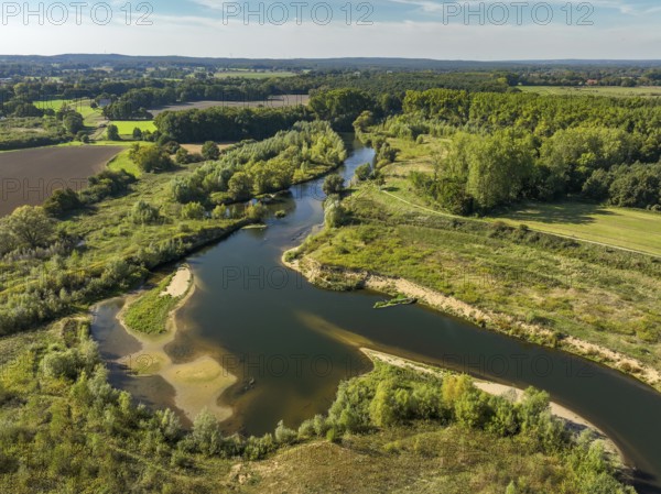 Datteln, North Rhine-Westphalia, Germany - Lippe, river and floodplain development of the Lippe near Haus Vogelsang, a near-natural river landscape was created here, an intact river-floodplain ecosystem restored with flood protection through redesigned flooded areas. The new Lippe-Schleife has created an extensive floodplain landscape that provides valuable habitat for animal and plant species