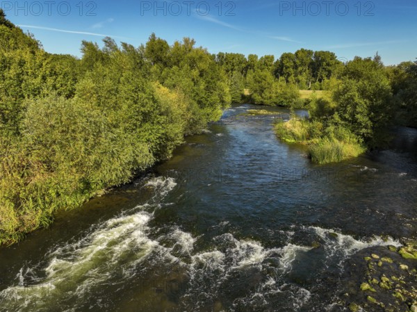 Datteln, North Rhine-Westphalia, Germany - Lippe, river and floodplain development of the Lippe near Haus Vogelsang, a near-natural river landscape was created here, an intact river-floodplain ecosystem restored with flood protection through redesigned flooded areas. Rapids and sole glides ensure protection against erosion and better aeration of the water