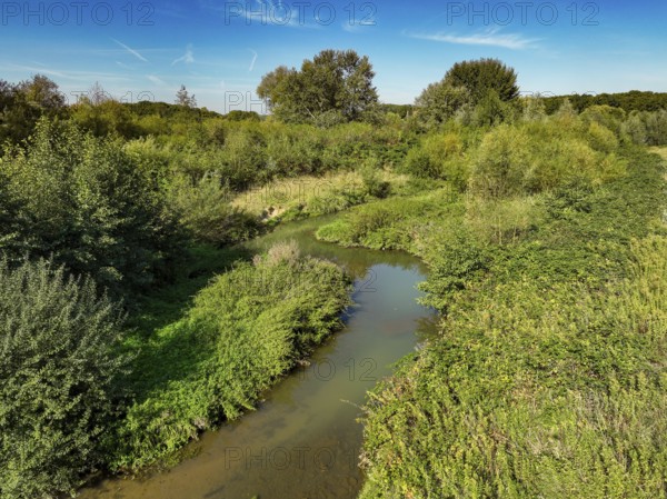 Datteln, North Rhine-Westphalia, Germany - Renatured Dattelner Mühlenbach just in front of flowing into the Lippe at the KLA Dattelner Mühlenbach sewage treatment plant
