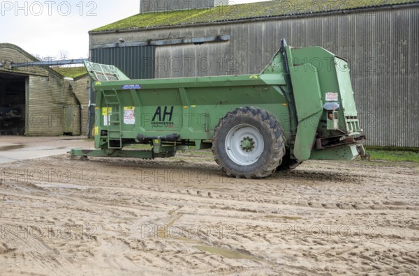 Agri-Hire Challenger 11 SD, specialized spinning disc muck spreader manufactured by Agri-Hire Ltd in farmyard, Sutton, Suffolk, England, UK