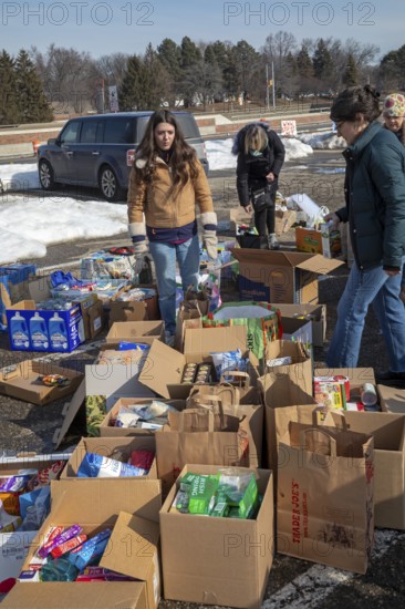 Oak Park, Michigan USA - 14 February 2026 - Volunteers collect food and other items for immigrants threatened by ICE. The Valentine's Day collection was called Love Without Borders: Valentine Care for Immigrant Neighbors