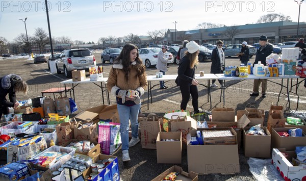 Oak Park, Michigan USA - 14 February 2026 - Volunteers collect food and other items for immigrants threatened by ICE. The Valentine's Day collection was called Love Without Borders: Valentine Care for Immigrant Neighbors
