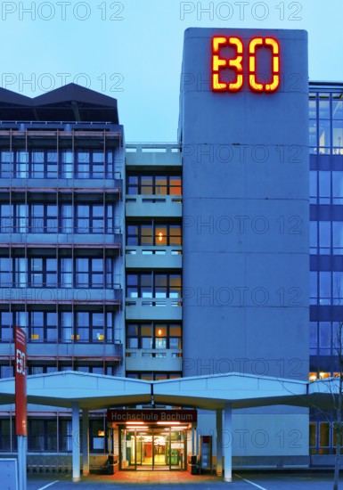 Main building of Bochum University with red BO logo in the evening, Central Campus, Bochum, Ruhr area, North Rhine-Westphalia, Germany
