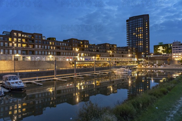 Maasboulevard and city harbor in Venlo at dusk, the Netherlands