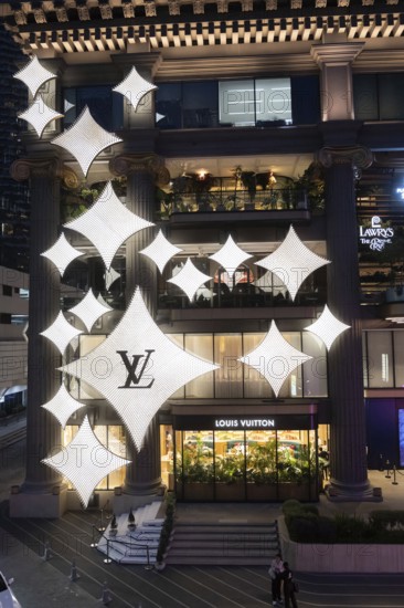 Bangkok, Thailand. March 19th 2025. Louis Vuitton designer fashion logo displayed on the flagship store near the EM District and Emporium Mall, a fashionable shopping district of Bangkok, Thailand
