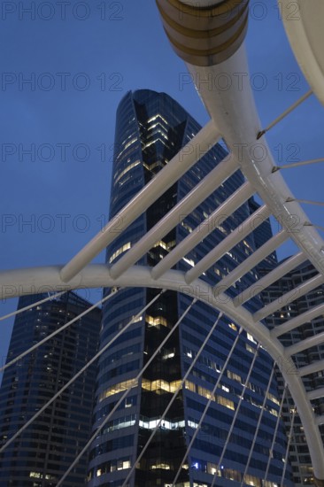 Bangkok, Thailand. March 26th 2025. Modern high rise office and condo buildings at night in Sathon Square part of the Bangkok business district, Thailand, Asia