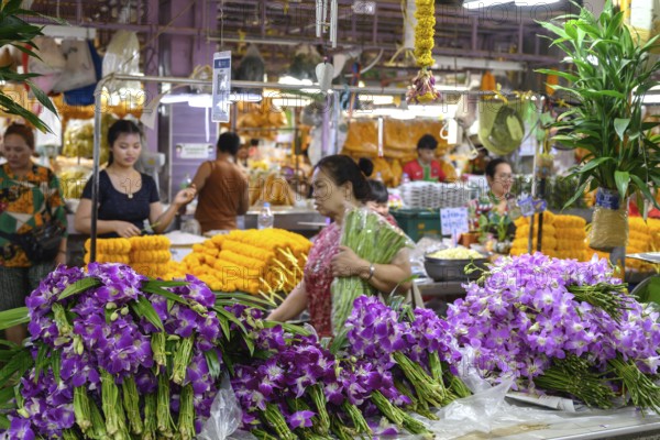 Bangkok, Thailand. March 2rd 2025. Thai workers and customers inside Pak Khlong Talat-Bangkok Flower Market, a busy wholesale market that works 24 hours a day