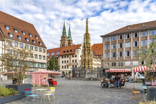 The Beautiful Fountain on the Main Market Square and the Towers of St. Sebaldus Church, Nuremberg, Bavaria, Germany