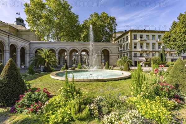 Fountain in the spa garden and arcade construction in the state spa Bad Kissingen, Lower Franconia, Bavaria, Germany