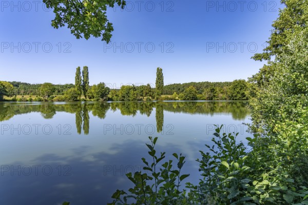 The Angersee or Baiersdorfer Weiher in Baiersdorf, Upper Franconia, Bavaria, Germany
