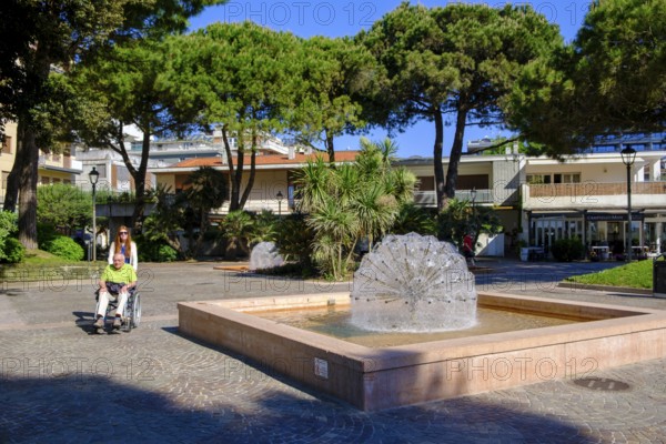 Pedestrian zone, fountain in the Marchesan park, Grado, Julian Friuli, Adriatic Sea, Italy