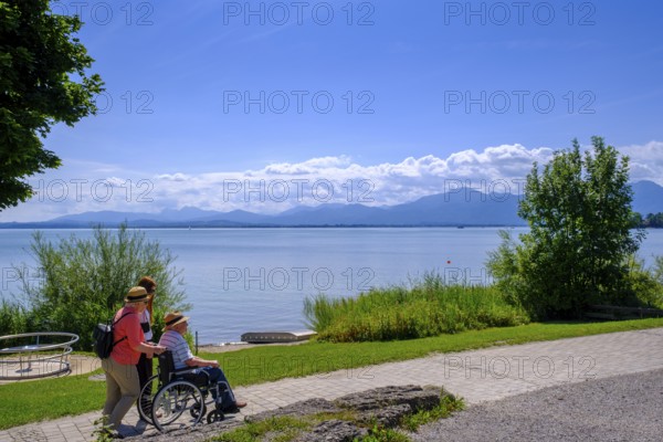 Walkers with wheelchair, Gstadt am Chiemsee, Chiemgau, Upper Bavaria, Bavaria, Germany