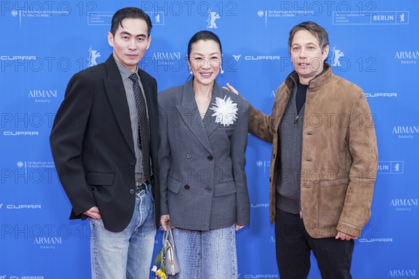 Hang Chong, Michelle Yeoh and Sean Baker in front of the premiere of the film Everything Everywhere All At Once at the Berlinale in Berlin's Zoo Palast on 13.02.2026. The 76th Berlin International Film Festival will take place from February 12 to 22, 2026