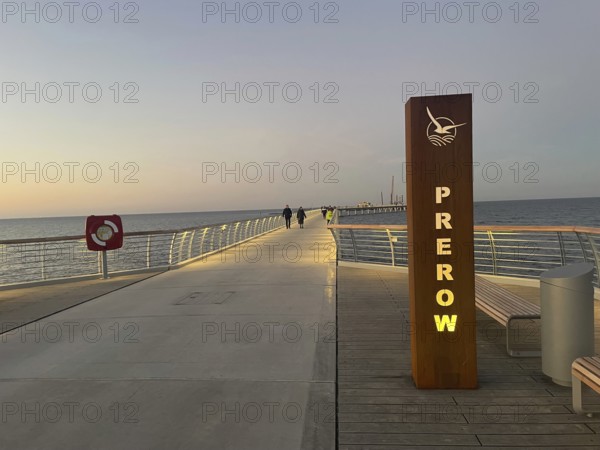 Baltic resort Prerow, pier, night view, sunset, twilight, Baltic Sea. At 720 meters, it is the longest pier in the Baltic Sea region. It became on October 16, 2024. Western Pomerania Lagoon Area, Darss-Zingster Bodden Range, Baltic Sea, Peninsula, Nature, Autumn, Nature Reserve, Fischland-Darß-Zingst, Mecklenburg-Western Pomerania, Germany