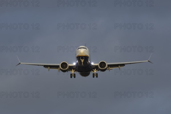 Boeing 737 commercial passenger airliner jet aircraft of Ryanair airways in flight on approach to land at London Stansted airport, Essex, England, United Kingdom