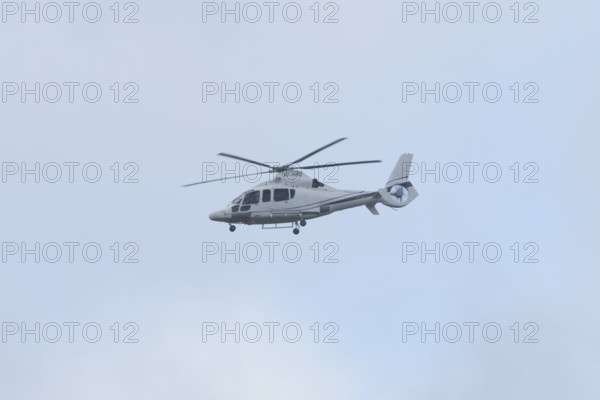 Eurocopter EC-155B-1 Dauphin 2 Airbus Helicopters H155 Helicopter A7-HMD in flight, England, United Kingdom
