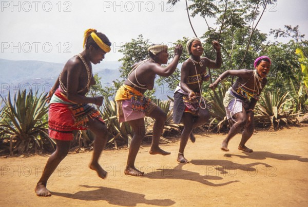 Zulu woman dancers dressed in traditional attire, performing at an outdoor cultural event likely KwaZulu-Natal province, South Africa, Africa 1979