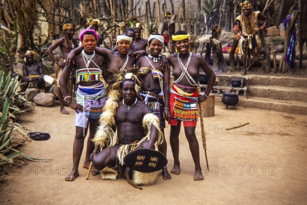 Group of Zulu people dressed in traditional attire, performing at an outdoor cultural event likely KwaZulu-Natal province, South Africa, Africa 1979