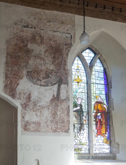 Medieval wall painting of Saint Christopher carrying the Christ child, church of Saint Mary, Martlesham, Suffolk, England, UK