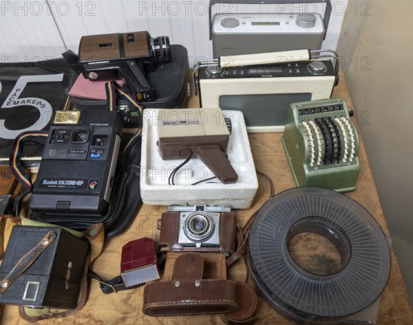 Display of film cameras, cine camera, transistor radios and other types of old analogue technology, UK