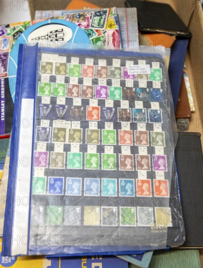 Stamp album collection page of Queen Elizabeth II Machin decimal definitive stamps, both mint and used, UK