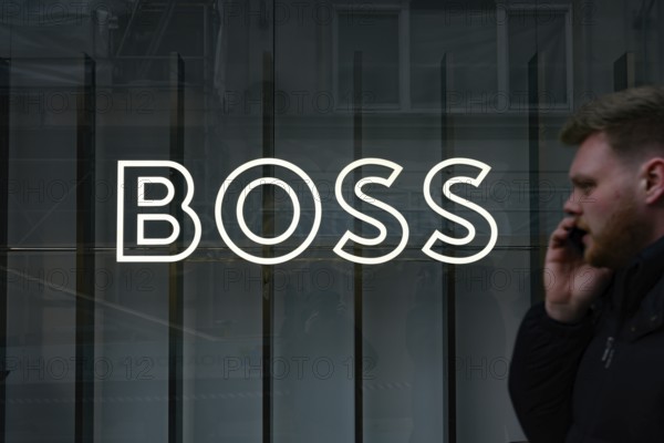 London, UK. January 29th 2025. The shop window logo for Boss, Hugo Boss a high end fashion retailer located in the fashionable shopping street of New Bond Street, Mayfair, London, UK