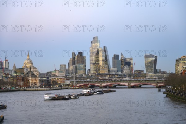 London, UK. January 30th 2025. The dome of St Pauls and the modern high rise buildings of The City, London's economic and financial district beside the River Thames, London, UK