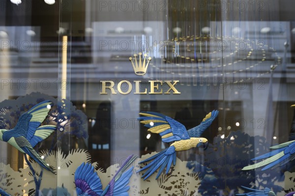 London, UK. January 29th 2025. Gold logo of Rolex luxury watches displayed in the stores Old Bond Street branch in the fashionable shopping district of the West End of London, UK