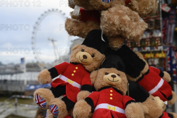 London, UK. January 31st 2025. Typical London themed children's toy bears for sale to tourists with the iconic London Eye in the background, Westminster, London, UK