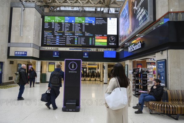 London, UK. January 30th 2025. Passengers waiting in front of the train departure time display board in Charing Cross rail station in central London, UK