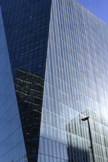 Close-Up architectural detail of a modern glass fronted office building in the city of London, economic and financial centre of the United Kingdom