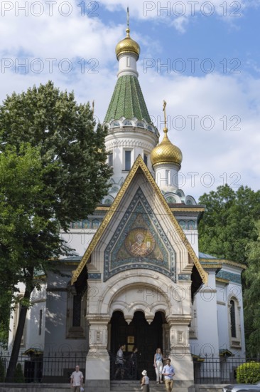 Sofia, Bulgaria. June 21st 2025. Church of St. Nicholas the Wonderworker, a historical Russian Orthodox church featuring a colorful tiled exterior & gilded onion domes, Sofia, Bulgaria
