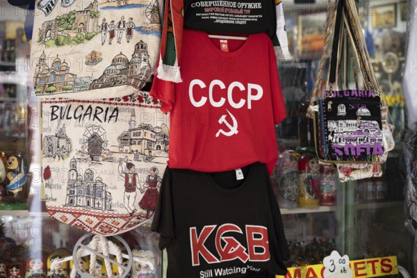 Sofia, Bulgaria. June 21st 2025. CCCP and KGB Soviet style souvenir T shirts for sale to tourists from a gift shop in Sofia, capital of Bulgaria