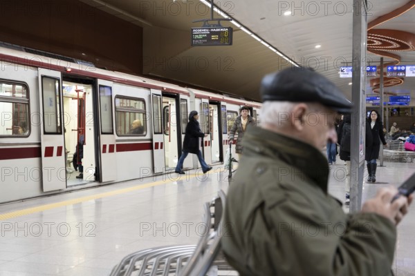 Sofia, Bulgaria. November 22nd 2025. Passengers on the platform of NDK metro station in central Sofia city center, Bulgaria