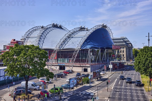 Musical Dome, large tent, road, general architecture, road markings lanes and stop line, cars, parking lot, lawn, trees, bird's eye view, blue sky, cirrus clouds, federal road B51, Konrad-Adenauer-Ufer, Cologne, district-free city, North Rhine-Westphalia, Germany