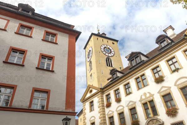 Regensburg, Germany. October 7th 2024 Regensburg clock tower and beautiful medieval architecture of German Bavarian city of Regensburg on the River Danube, Germany